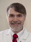 Dr. Werner De Riese, MD
