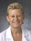 Dr. Eugenie Komives, MD
