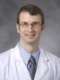 Dr. Mitchell Cox, MD