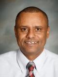 Dr. Menelik Mulu, MD