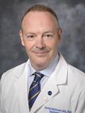 Dr. Dermot McGovern, MD