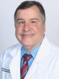 Dr. Carlos Martinez-Solis, MD