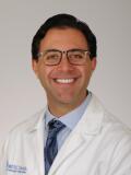 Dr. Adam Tanious, MD