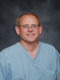 Dr. Hollis Sigman, MD