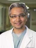 Dr. Adhvaryu