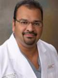 Dr. Nasser Razack, MD