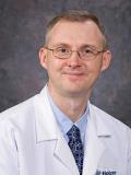 Dr. Jeremy Cuzzourt, MD