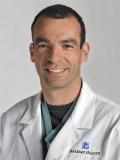 Dr. Zacharis