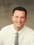 Dr. Justin Warcup, DDS