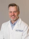 Dr. Daniel Nicholson, MD