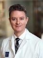 Dr. Raymon Grogan, MD
