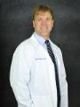Dr. Brett Hutton, MD