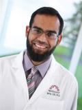 Dr. Tariq Gill, MD