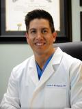 Dr. Carlos Rodriguez, DC