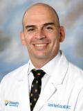 Dr. Jose Improvola, MD