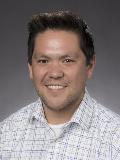 Dr. Travis Omura, MD photograph
