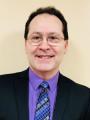 Dr. Carlos Carrion, DDS