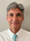 Dr. Carlos Becerra, MD