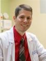 Dr. Justin Wilkin, MD