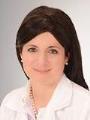 Dr. Christa Abraham, MD