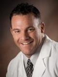 Dr. Brett Travis, MD