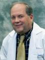 Dr. Alan Briker, MD