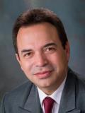 Dr. Carlos Rigau, DMD
