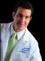 Dr. Carlos Placer, MD