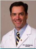 Dr. John Stoneham, MD