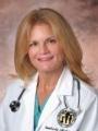 Dr. Tamberly Mccarus, MD