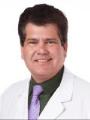 Dr. Alberto Santos, MD