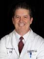 Dr. Adrian Roberts, MD