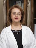 Dr. Marjan Alvand, DDS
