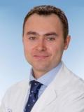 Dr. Muradov