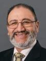 Dr. Carlos Paxtor, MD