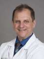 Dr. Larry Breeding, MD
