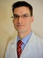 Dr. Christopher Arett, MD