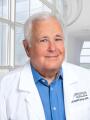 Dr. Christopher George, MD