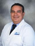 Dr. Carlos Revelo, MD