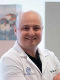 Dr. Anthony Bouza, DDS