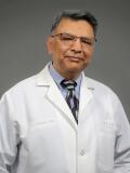 Dr. Mrinal Sharma, MD