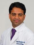 Dr. Mandhadi